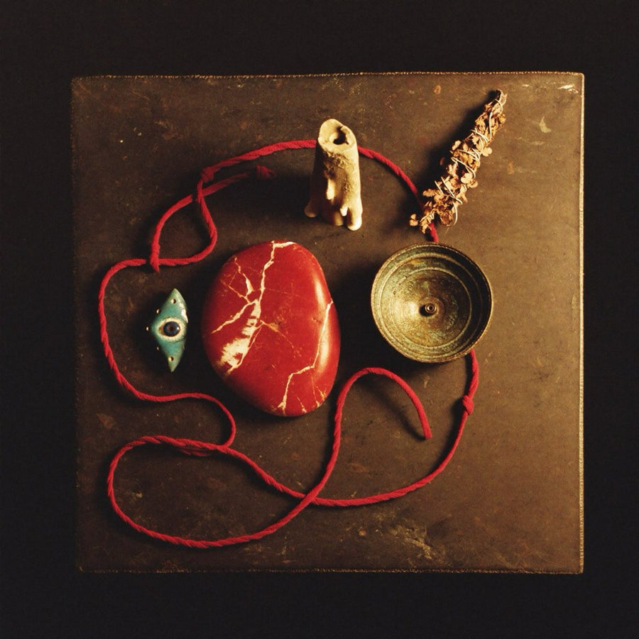A candlelit altar prepared for a working